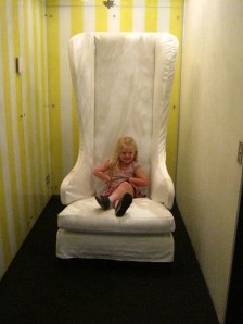 Neat high back chair in the adjacent business.